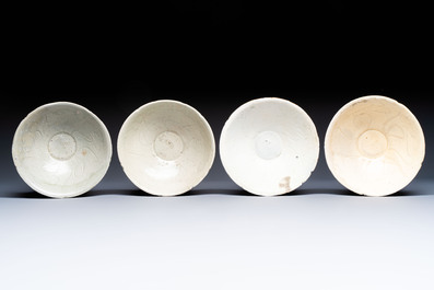 A group of 12 Chinese celadon-glazed bowls with incised floral design from the Jepara shipwreck, Fujian kilns, Song