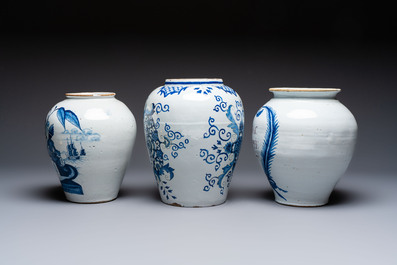 A blue and white Dutch Delft tobacco jar and two French tobacco jars with brass lids, 18/19th C.