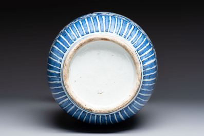 A Chinese blue, white and copper-red 'Deer' vase, 19th C.