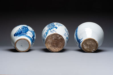 A blue and white Dutch Delft tobacco jar and two French tobacco jars with brass lids, 18/19th C.