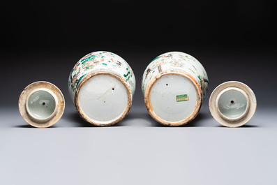 A pair of Chinese famille rose 'Roosters' vases and covers, 19th C.