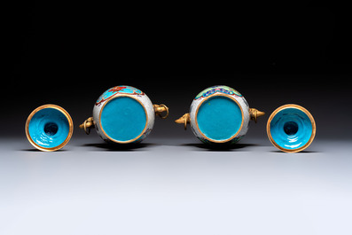 Two Chinese cloisonn&eacute; vases on wooden stands, 20th C.