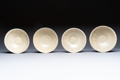 A group of 12 Chinese celadon-glazed bowls with incised floral design from the Jepara shipwreck, Fujian kilns, Song