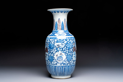 A Chinese blue, white and copper-red 'Deer' vase, 19th C.