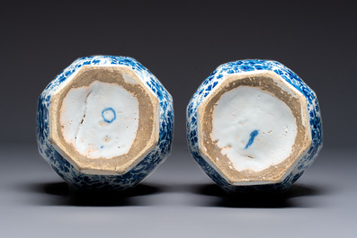 A pair of blue and white Dutch Delft garlic-head vases mounted as lamps, 18th C.