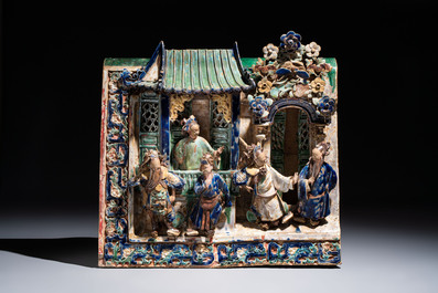 A large and fine Chinese polychrome-glazed Shiwan stoneware group of immortals, 19th C.