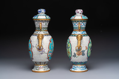 Two Chinese cloisonn&eacute; vases on wooden stands, 20th C.