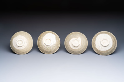 A group of 12 Chinese celadon-glazed bowls with incised floral design from the Jepara shipwreck, Fujian kilns, Song