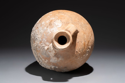 A Roman pottery olive oil transport amphora with marine encrustation, South of Spain, 1st/3rd C.