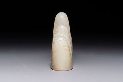 A Chinese white jade mountain-shaped brush rest with narcissus design, Dajie 大玠 mark, dated 1879