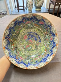 A Chinese Canton famille rose 'peacock' punch bowl, 19th C.