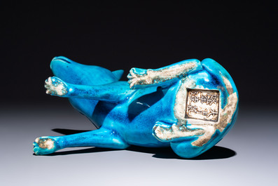 A Chinese turquoise-glazed model of a dog, Qianlong mark, 19th C.