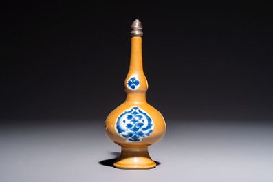 A Chinese blue and white capucine-ground rosewater sprinkler with silver mount, Kangxi