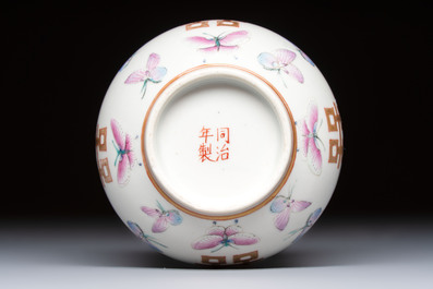 A Chinese famille rose 'Butterflies' spittoon, Tongzhi mark and of the period