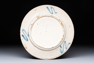 A blue, white and manganese Portuguese 'Deer' plate, 17th C.