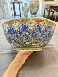 A Chinese Canton famille rose 'peacock' punch bowl, 19th C.
