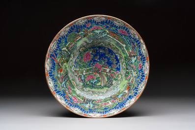 A Chinese Canton famille rose 'peacock' punch bowl, 19th C.