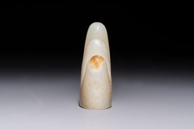 A Chinese white jade mountain-shaped brush rest with narcissus design, Dajie 大玠 mark, dated 1879