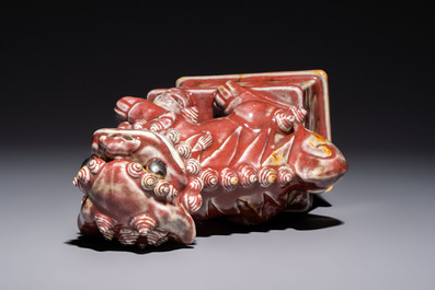 A Chinese copper-red-glazed Buddhist lion, 19th C.