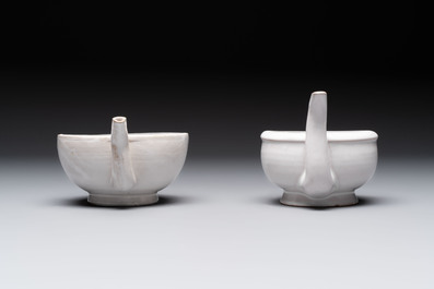 Seven white-glazed Delft or French faience feeding cups or 'Canards de Malade', 19th C.