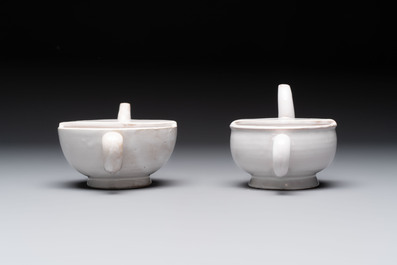 Seven white-glazed Delft or French faience feeding cups or 'Canards de Malade', 19th C.