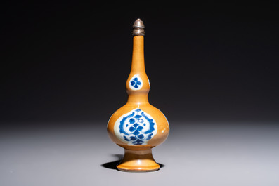 A Chinese blue and white capucine-ground rosewater sprinkler with silver mount, Kangxi