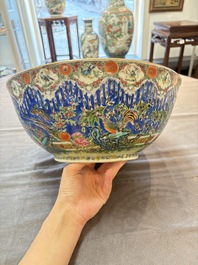A Chinese Canton famille rose 'peacock' punch bowl, 19th C.