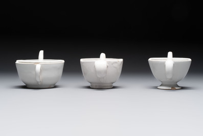 Seven white-glazed Delft or French faience feeding cups or 'Canards de Malade', 19th C.