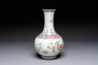 A Chinese famille rose 'Flowers and Fruits' bottle vase, Hongxian mark, Republic