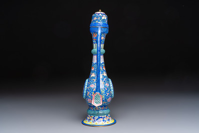 A Chinese Canton blue-ground enamel ewer and cover with floral design, 19th C.