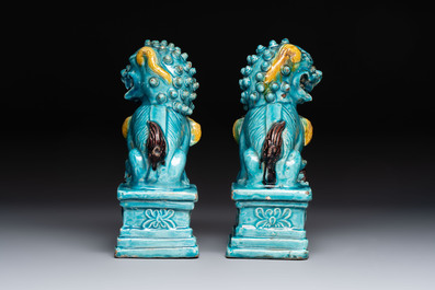 A pair of Chinese turquoise-glazed Buddhist lions, a pair of green-glazed parrots and a pair of miniature garden seats, 19/20th C.