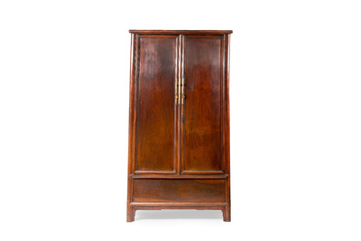 A large Chinese elmwood tapered round-corner cabinet, 'Yuanjiaogui', early Qing, 17/18th C.