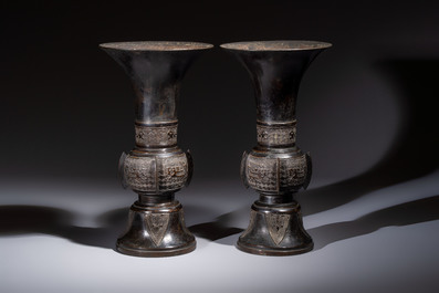 A pair of Chinese archaistic bronze 'Gu' vases, 18th C.