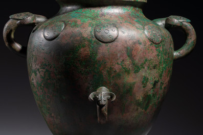 A large Chinese archaistic bronze wine vessel and cover with ram-form handles, Lei 罍, Ming