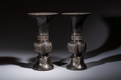 A pair of Chinese archaistic bronze 'Gu' vases, 18th C.