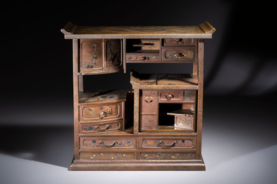 A fine Japanese bronze silver-, gold- and copper-inlaid miniature shodana cabinet, Meiji, 19th C.