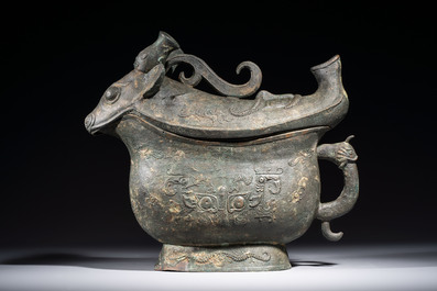 A rare and large Chinese archaistic bronze pouring vessel and cover, Gong 觥, Qing