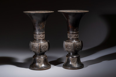 A pair of Chinese archaistic bronze 'Gu' vases, 18th C.