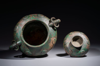 A large Chinese archaistic bronze wine vessel and cover with ram-form handles, Lei 罍, Ming