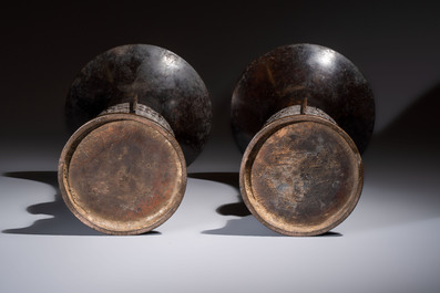 A pair of Chinese archaistic bronze 'Gu' vases, 18th C.