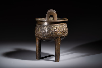 A rare Chinese gold- and silver-inlaid bronze 'Ding' censer with Taotie design on a hongmu stand, Shaosheng 紹聖 and Su Zhe 蘇轍 mark, Song or later