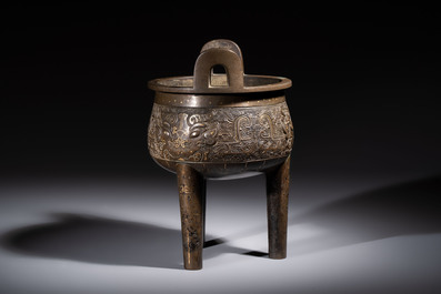 A rare Chinese gold- and silver-inlaid bronze 'Ding' censer with Taotie design on a hongmu stand, Shaosheng 紹聖 and Su Zhe 蘇轍 mark, Song or later