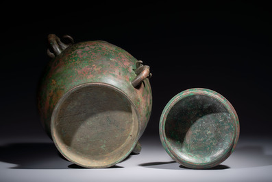 A large Chinese archaistic bronze wine vessel and cover with ram-form handles, Lei 罍, Ming