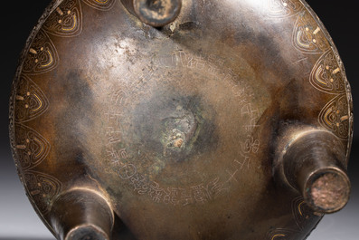 A rare Chinese gold- and silver-inlaid bronze 'Ding' censer with Taotie design on a hongmu stand, Shaosheng 紹聖 and Su Zhe 蘇轍 mark, Song or later