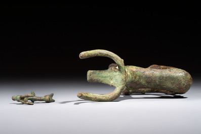 An Anatolian copper-alloy standard surmounted by a long-horned bull and a Luristan deer, 1st millennium BC.