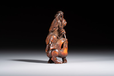 A small Chinese carved bamboo group of 'Liuhai', 19th C.