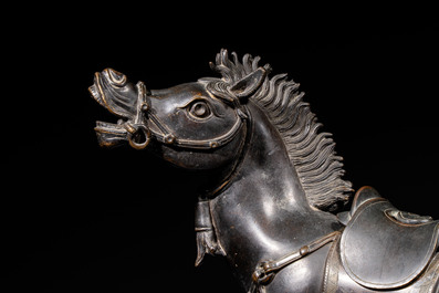 A large Chinese bronze horse-shaped incense burner and cover, 17/18th C.