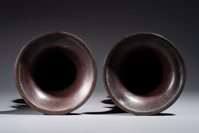 A pair of Japanese bronze vases with relief design of birds among flowering branches, signed Hasegawa Harusada 長谷川晴定, 19th C.