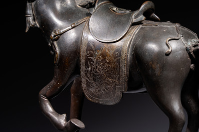 A large Chinese bronze horse-shaped incense burner and cover, 17/18th C.