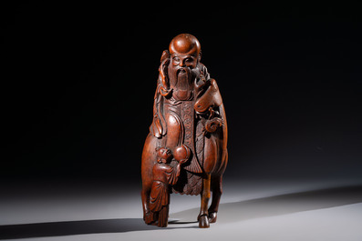 A large Chinese carved bamboo 'Shoulao' group, 19th C.
